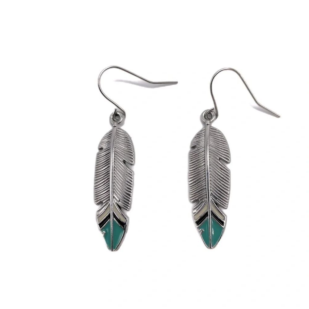 Boho Festival silver tone feather earrings with turquoise blue tips